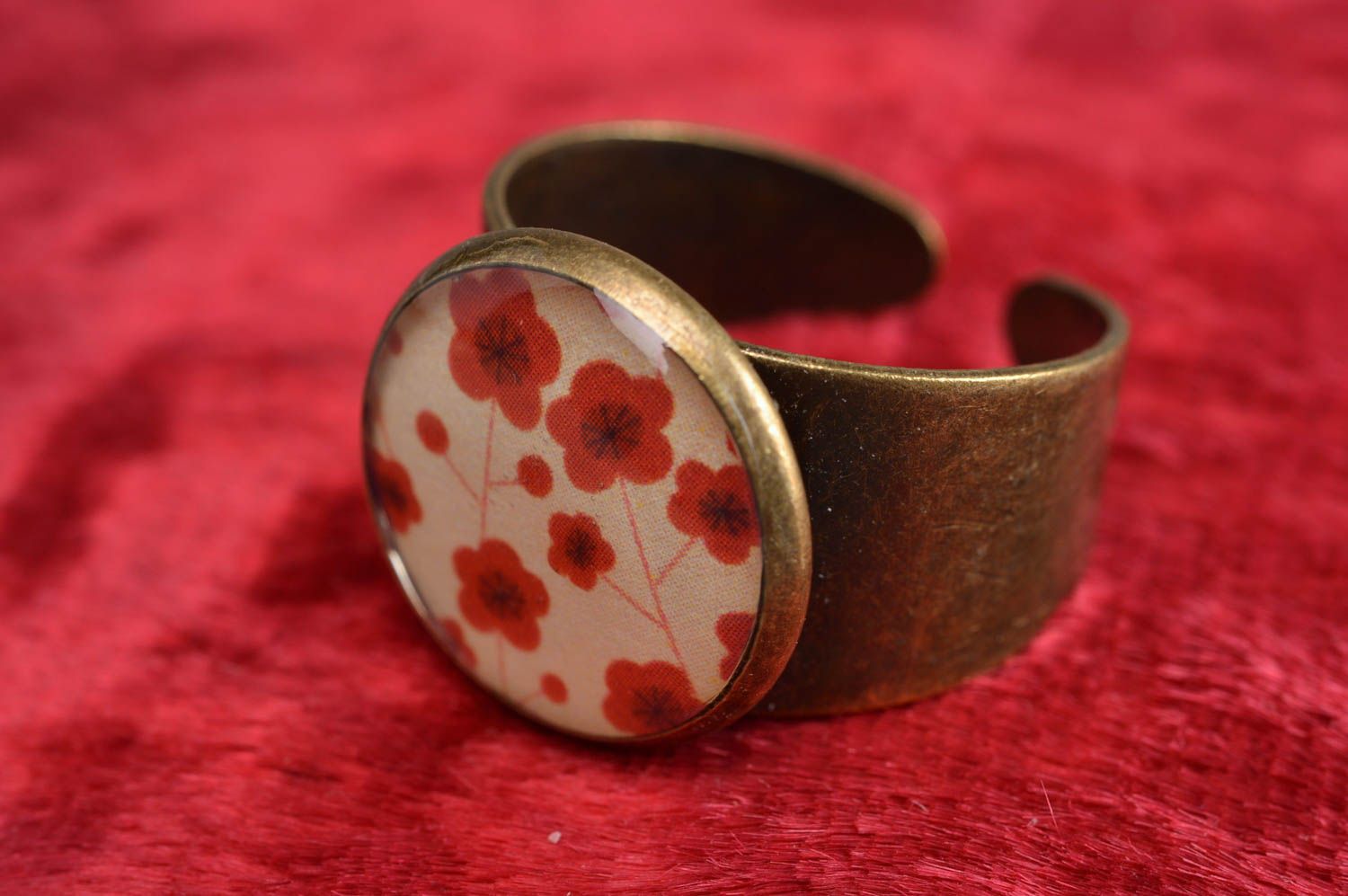 Handmade designer ring with decoupage technique print coated with jewelry resin photo 1