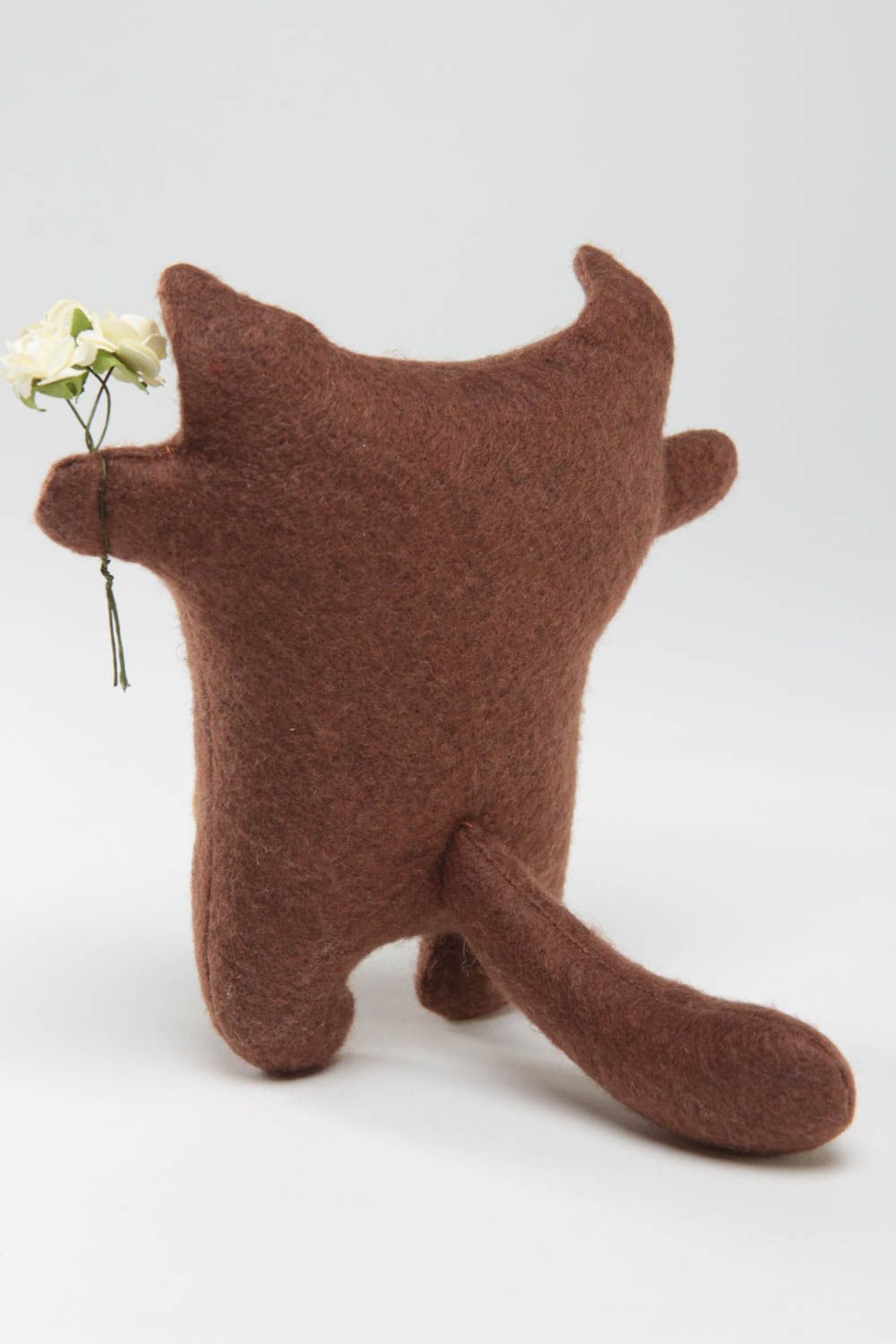 Handmade brown soft small toy made of felt in shape of cat with flowers photo 4