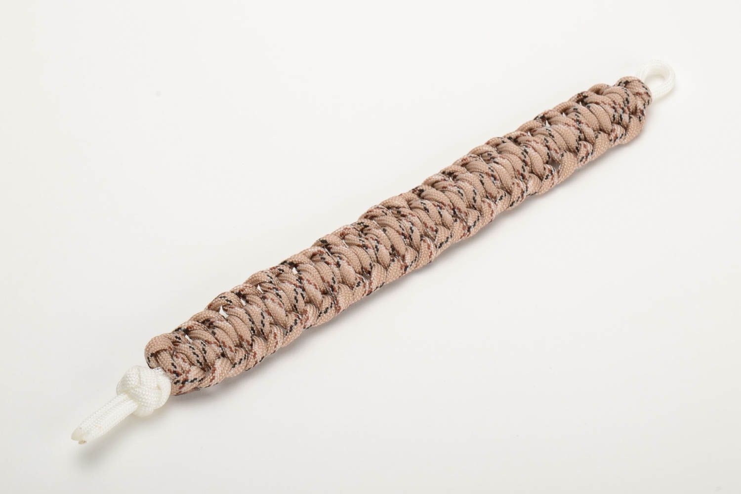 Handmade broad survival wrist bracelet woven of parachute cord of beige color  photo 2
