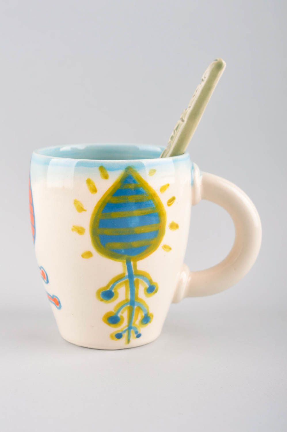 Ceramic 6 oz cup with handle and ceramic spoon with bright floral color photo 2