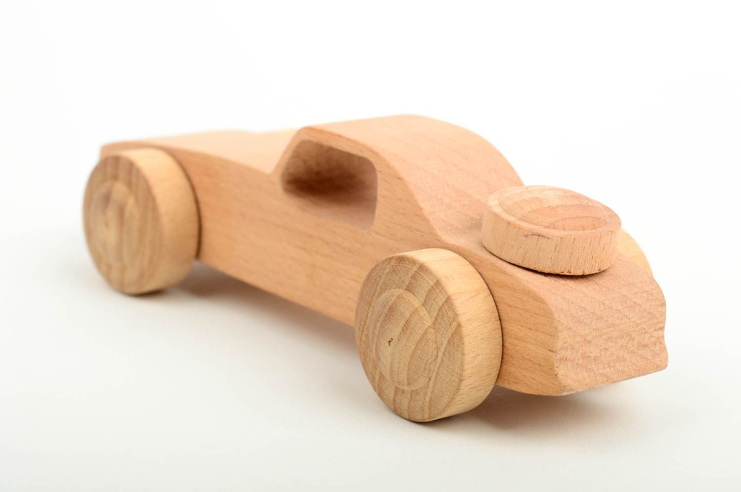 Auto aus Holz handmade Fahrzeug aus Holz ökologisch Holzspielzeug für Kinder foto 4