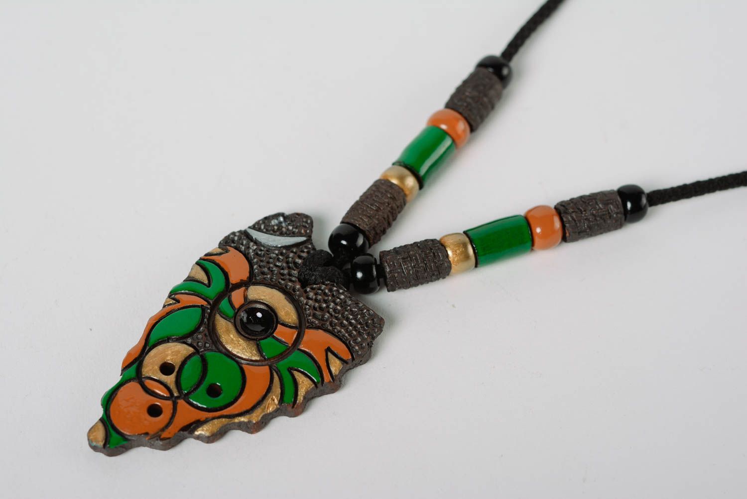 Interesting handmade designer clay pendant painted with color enamel on cord photo 2