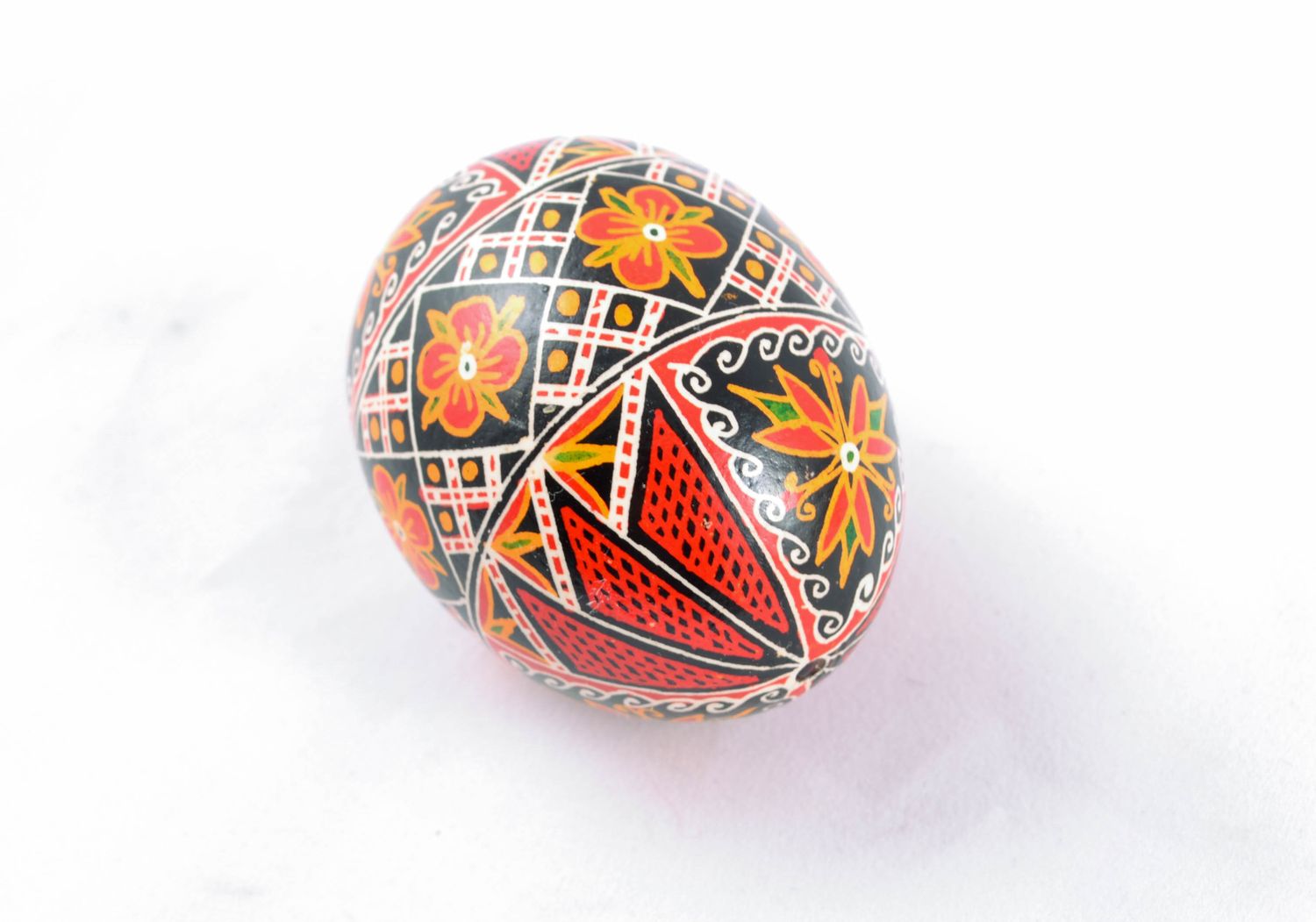 Handmade decorative painted egg with patterns in Ukrainian style photo 3