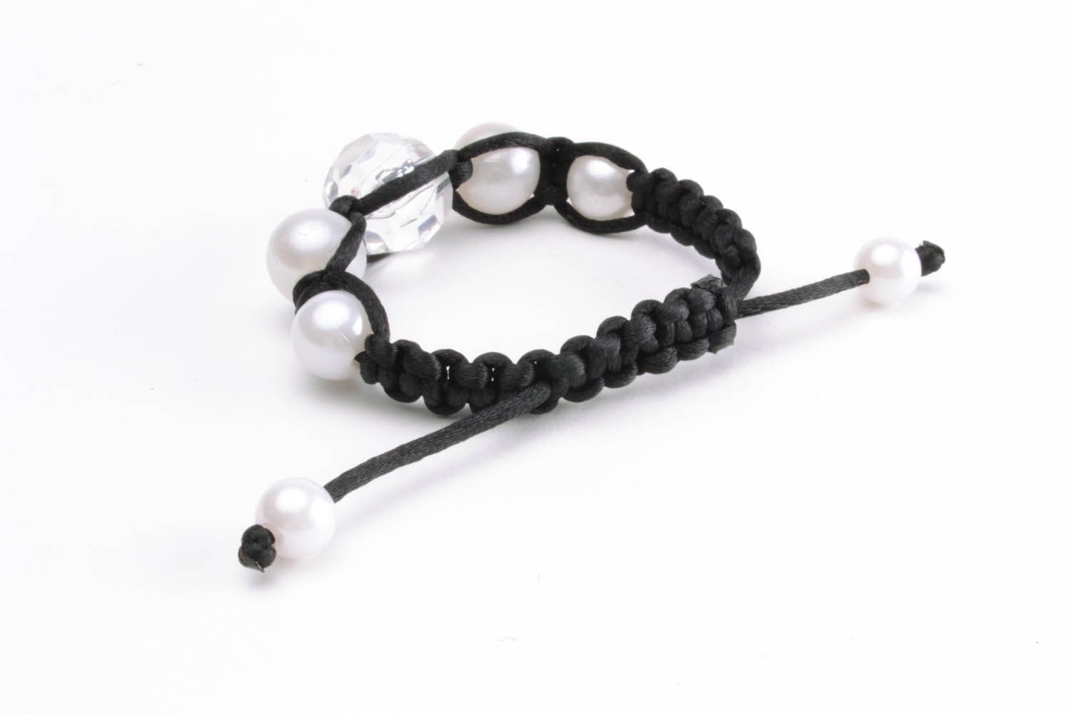 Braided bracelet with white beads photo 4