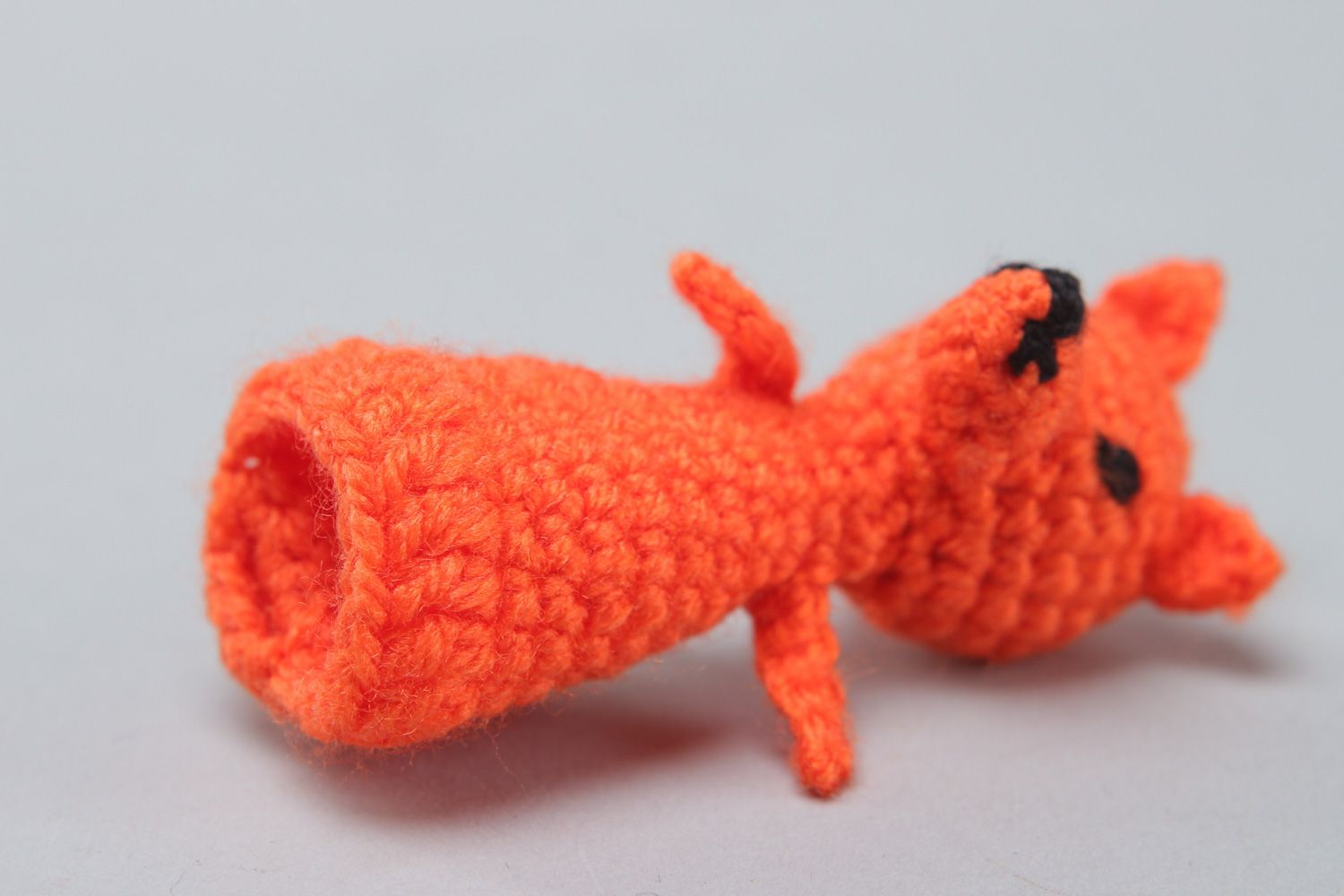 Small handmade finger puppet crocheted of acrylic threads in the shape of red fox photo 3