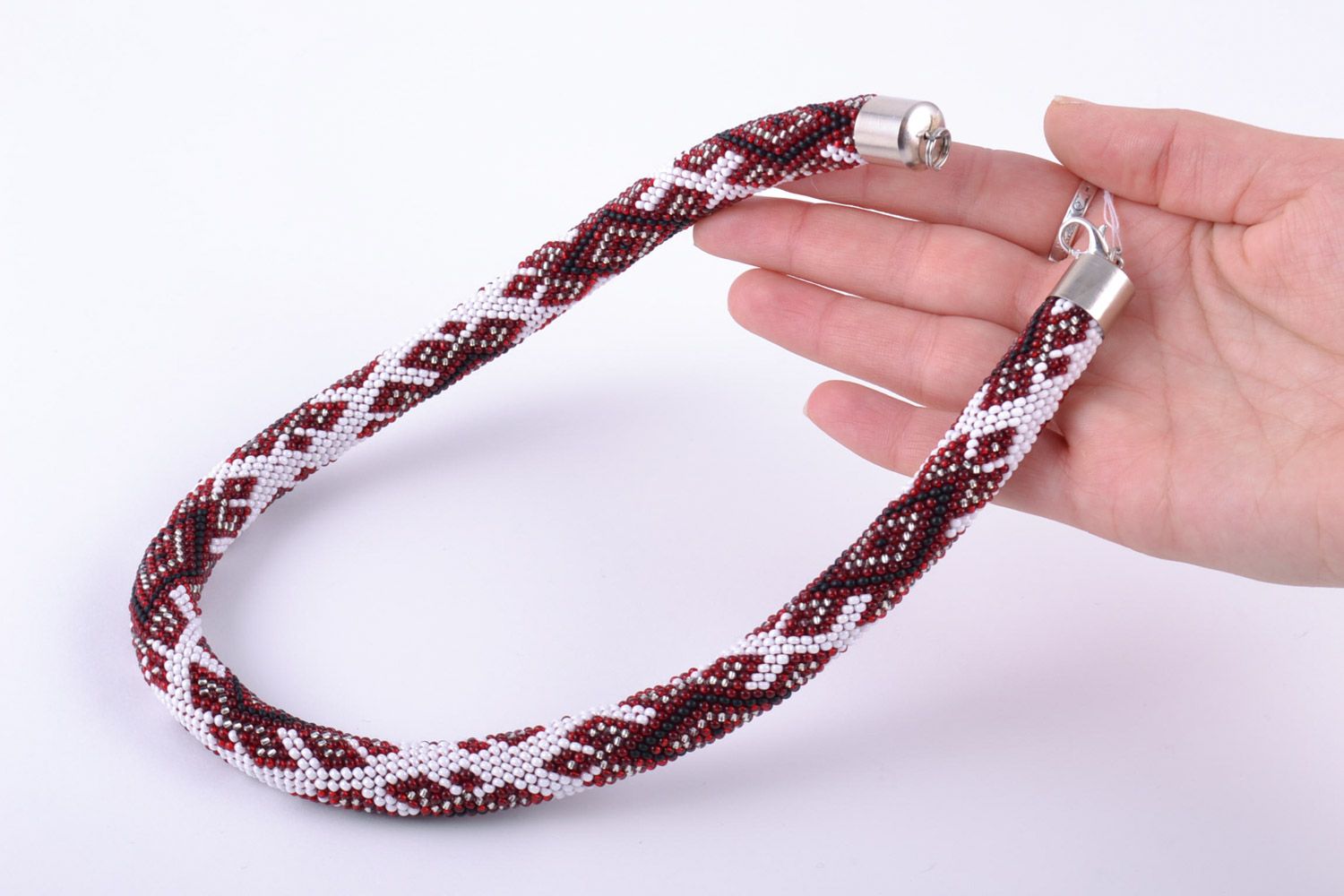 Handmade white beaded cord necklace with red patterns in ethnic style photo 2