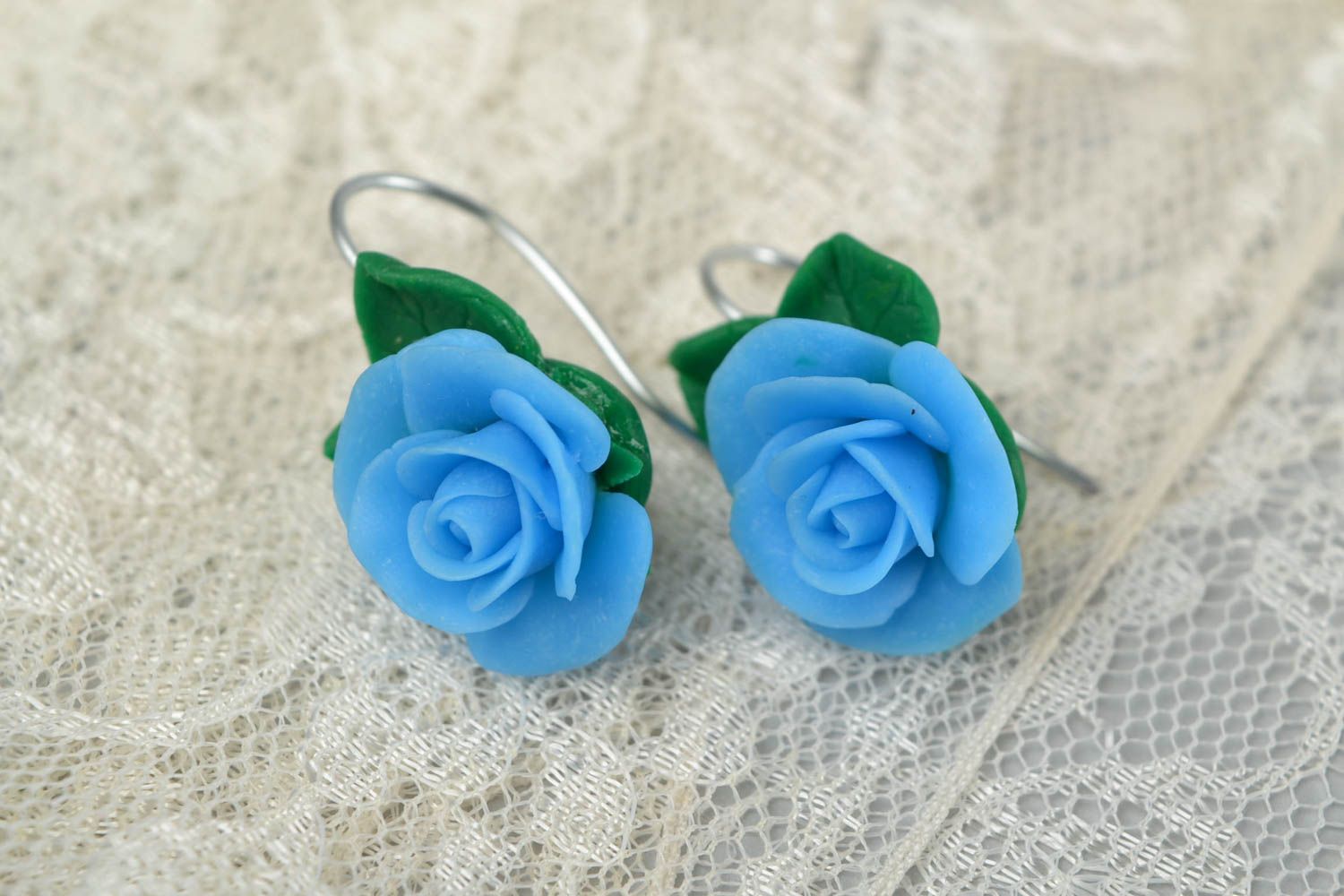 Beautiful handmade women's polymer clay flower earrings of blue color photo 1