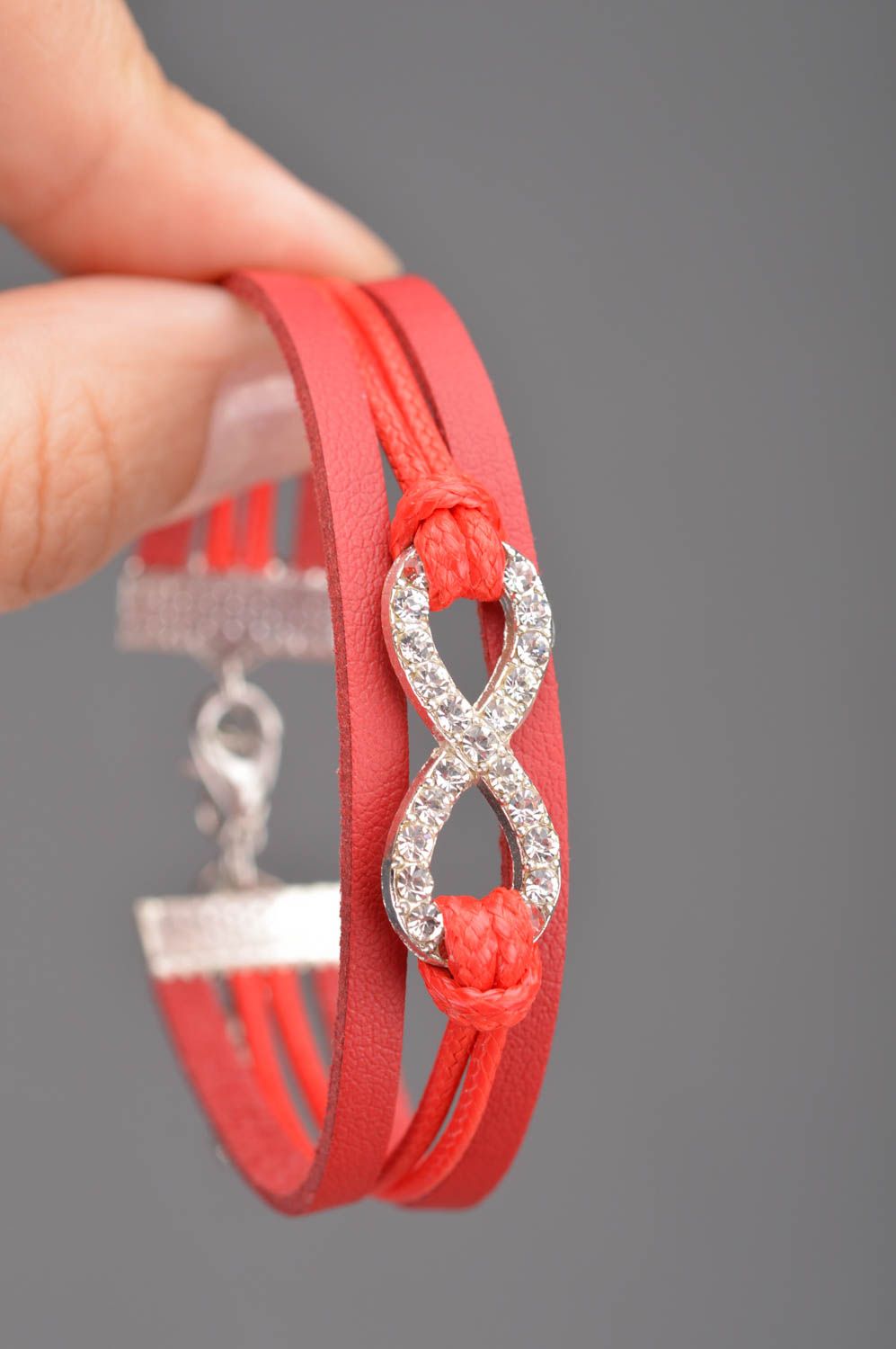 Handmade designer red thin genuine leather bracelet with infinity sign insert photo 2
