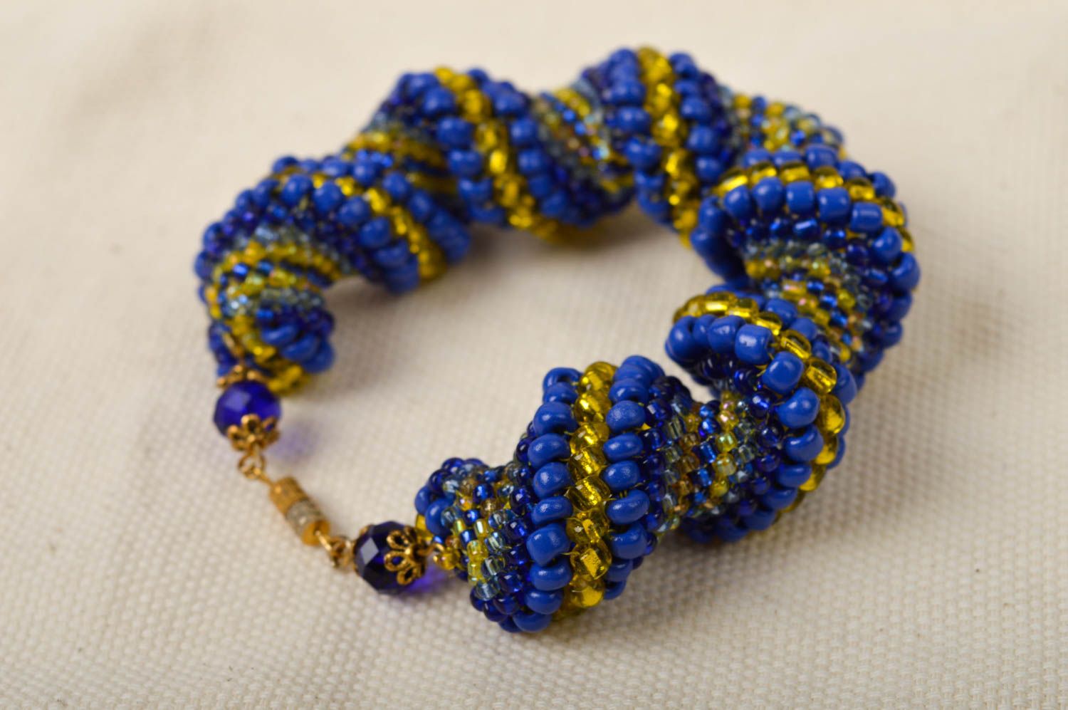 Dark blue and gold color beads bracelet on chain adjustable cord photo 1