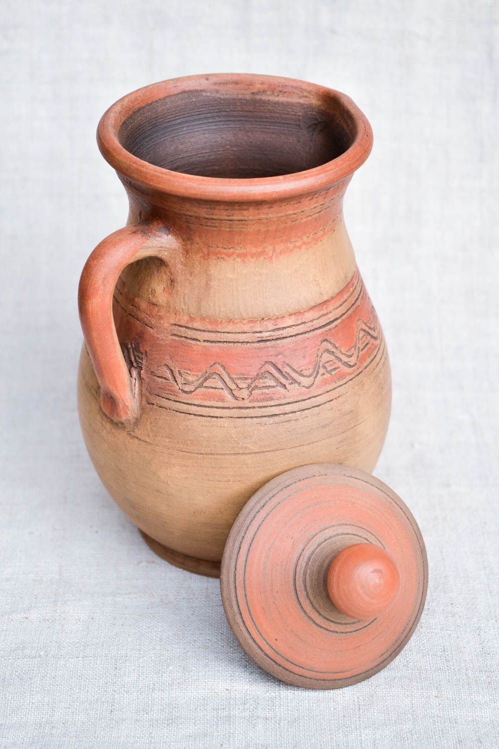 Jarro de cerámica hecho a mano recipiente de barro utensilio de cocina foto 3