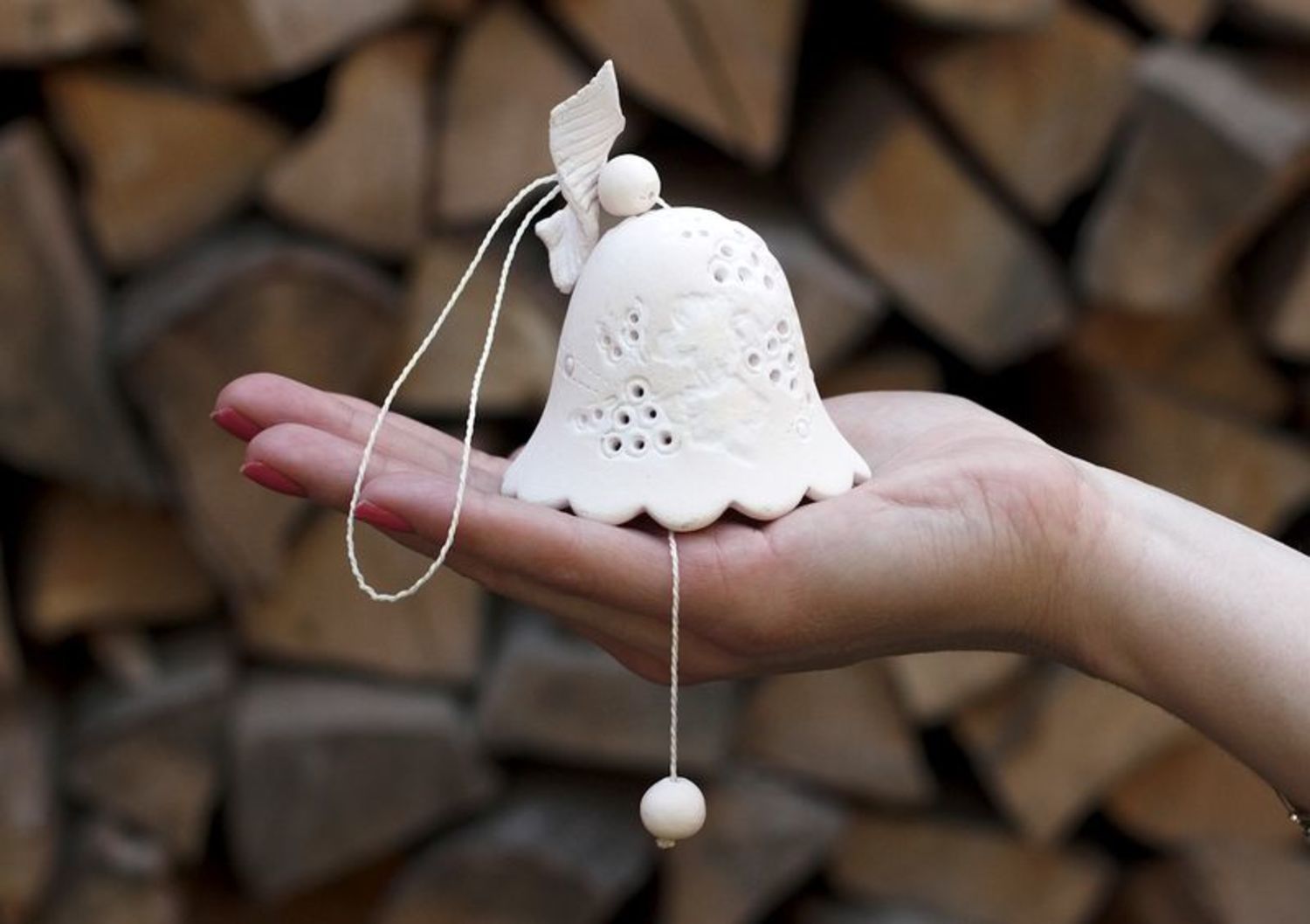 Ceramic bell made from white clay photo 3
