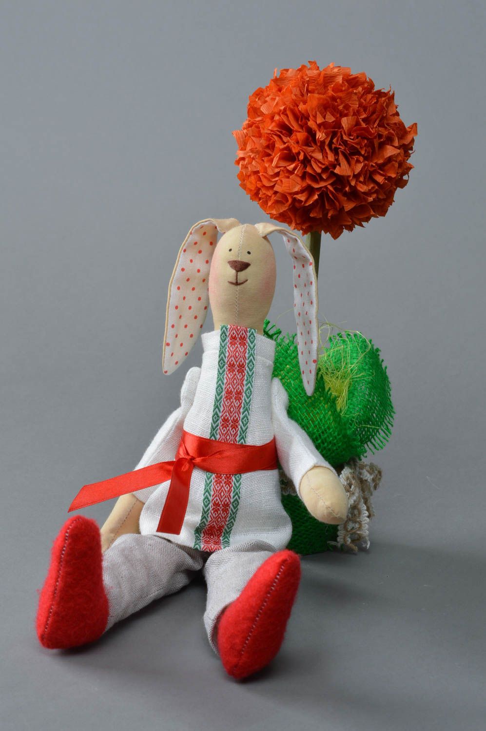 Handmade linen and cotton fabric soft toy rabbit in ethnic costume and red shoes photo 1