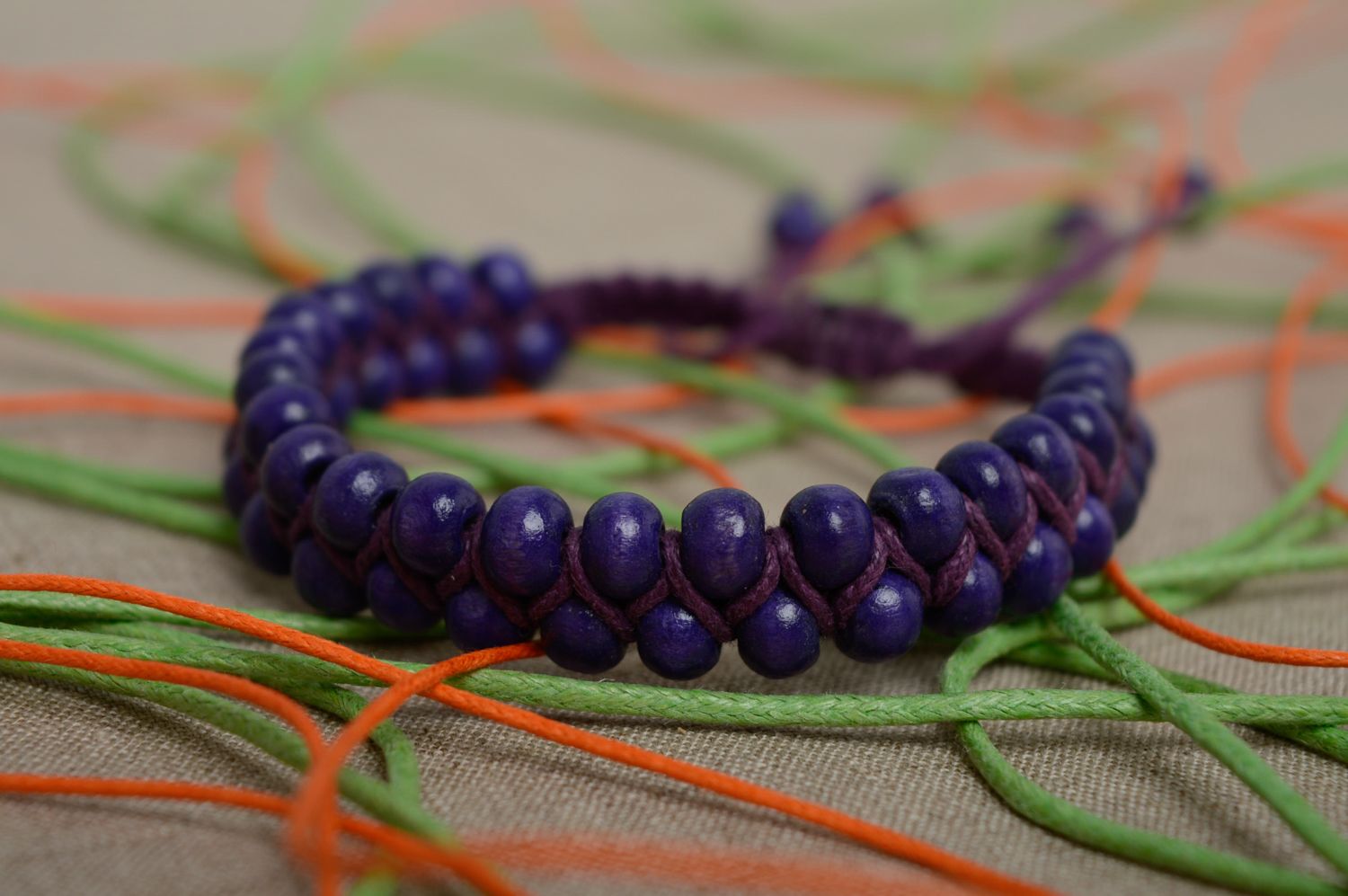 Violet macrame bracelet made of waxed cord and wooden beads photo 2