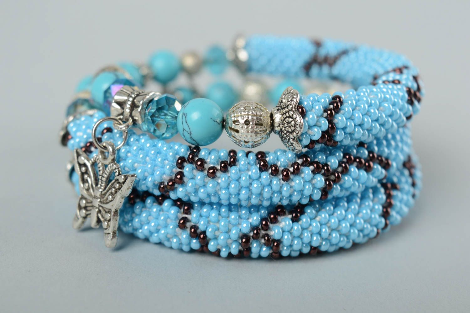 Turquoise beads cord bracelet with metal butterfly charm photo 4