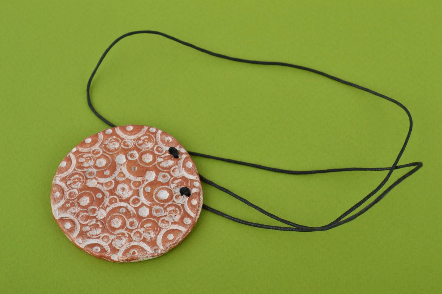 Female handmade painted unusual pendant made of red clay on lace photo 1