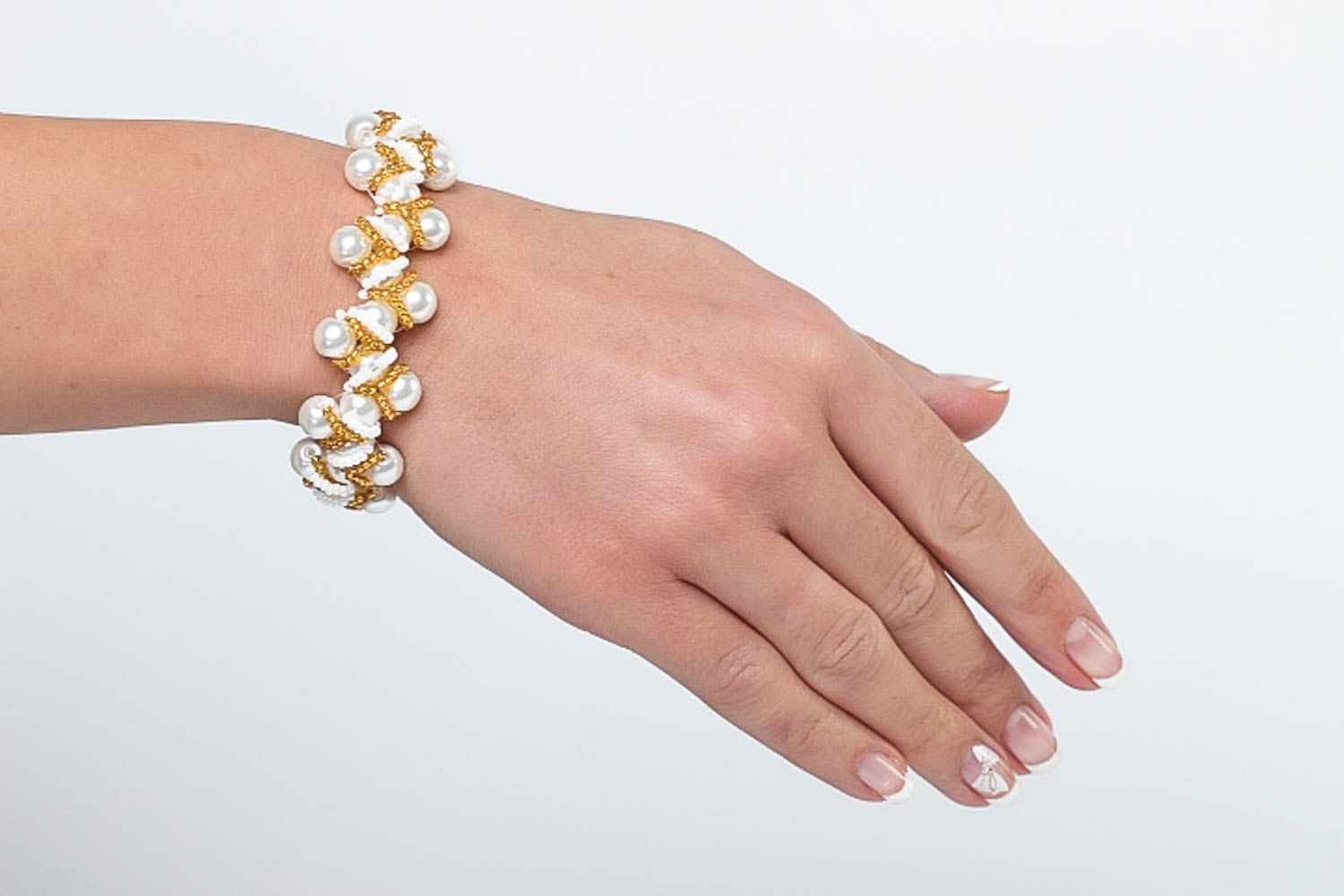 Girls charm beaded bracelet in white and golden colors  photo 5