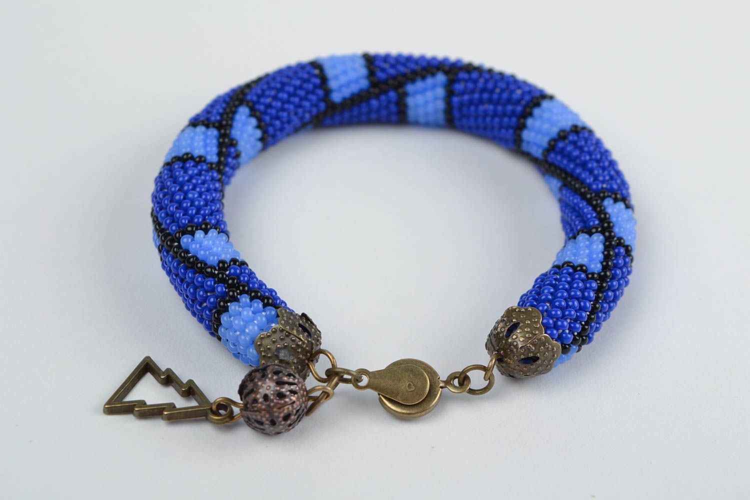 Handmade beautiful blue beaded cord bracelet with geometric paint photo 5
