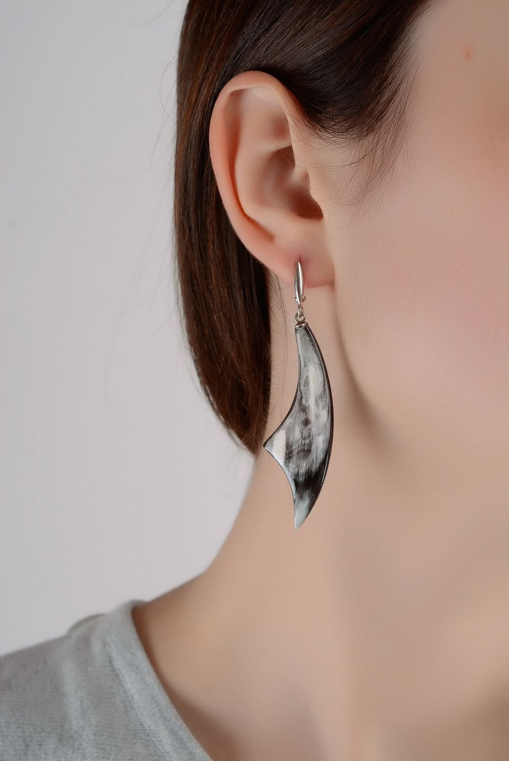 Earrings made of silver and cow horn photo 2