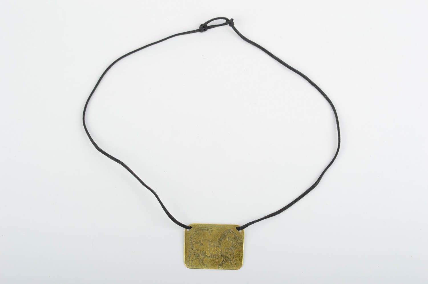 Handmade brass pendant metal bijouterie pendant on a lace brass accessories photo 2