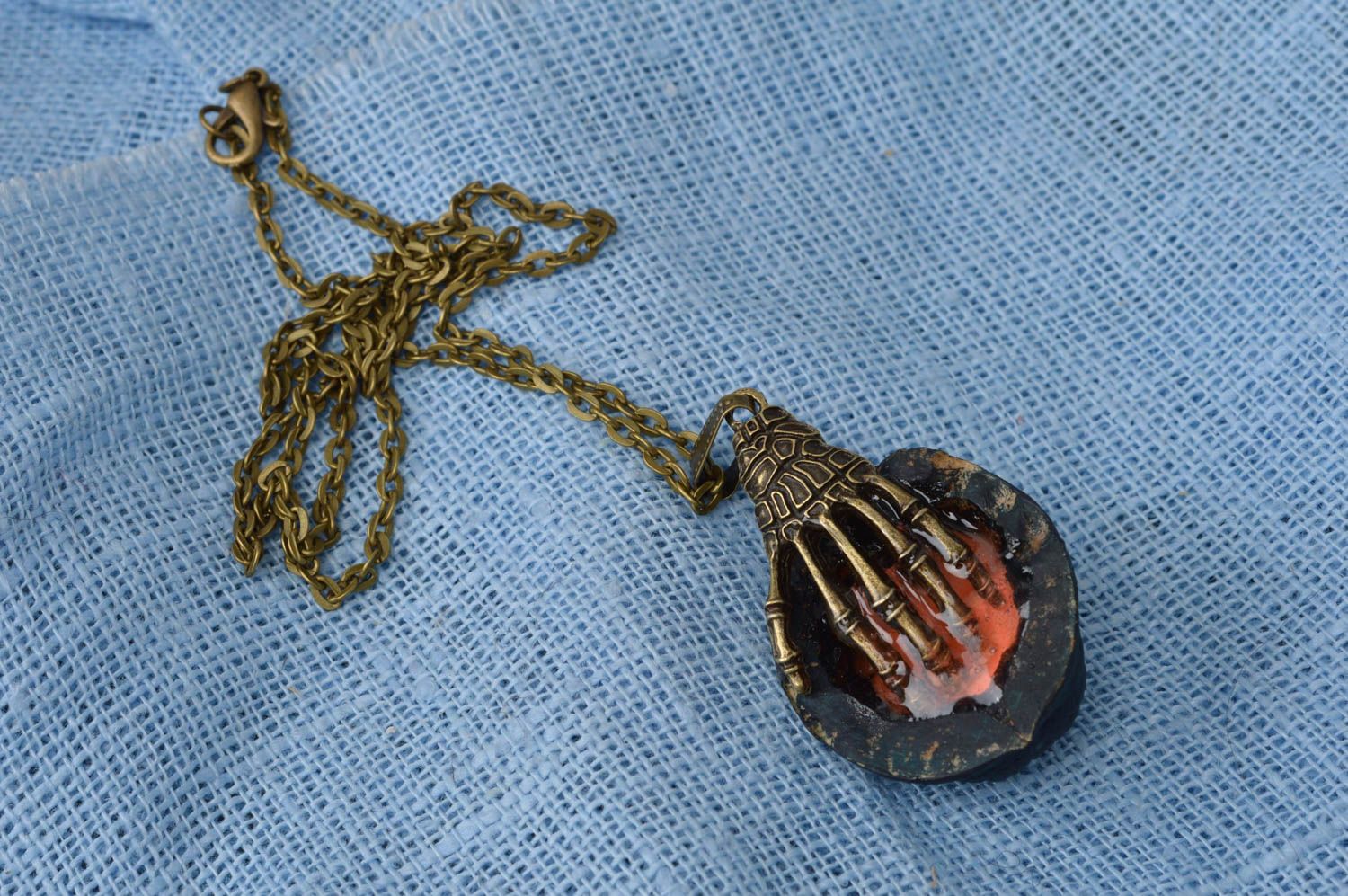 Luminous cute handmade pendant made of nut with metal hand Hand on heart photo 1