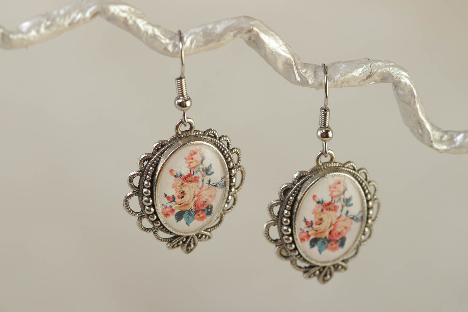 Stylish beautiful handmade glass glaze oval earrings with metal lace basis photo 1
