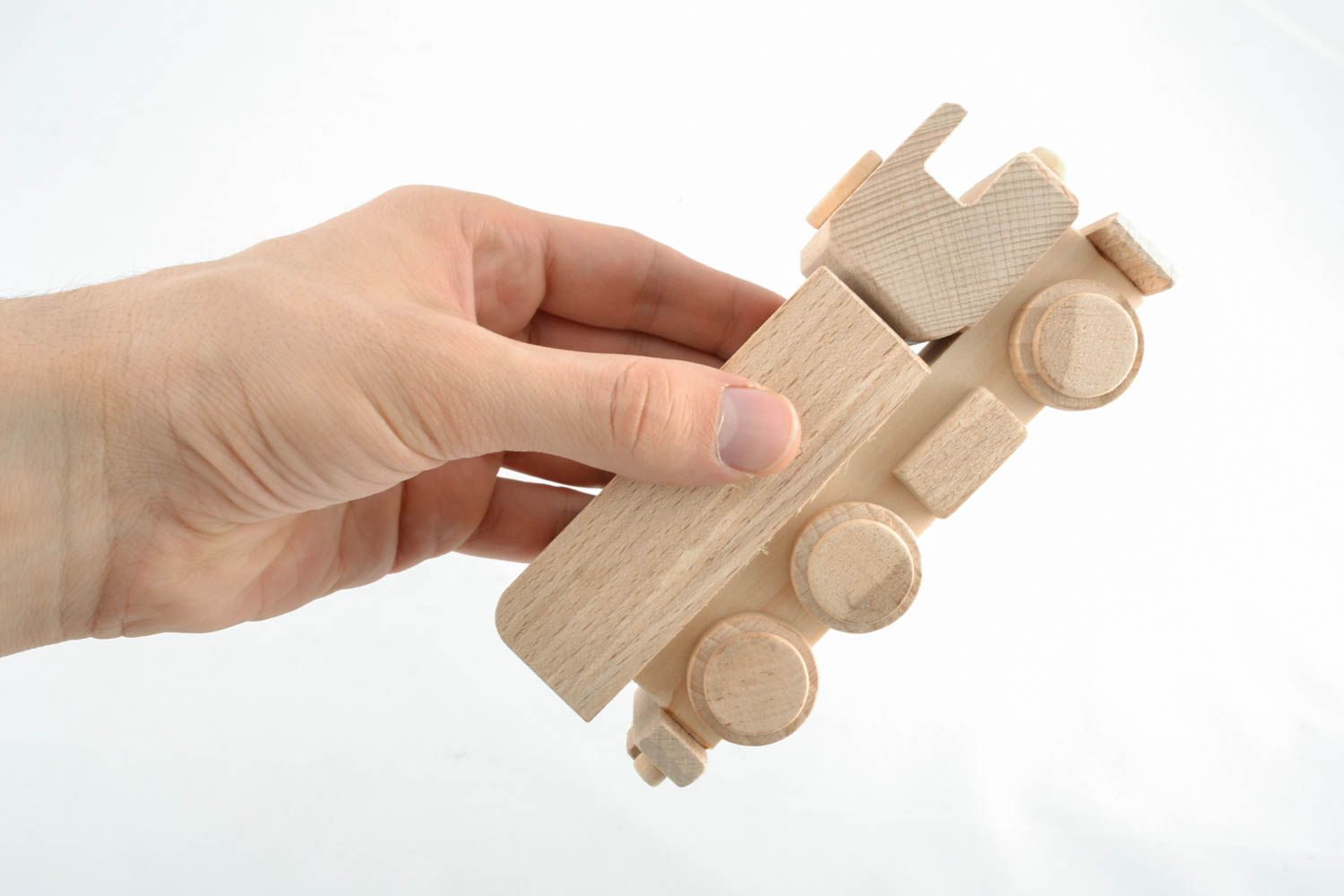 Деревянная игрушка для самых маленьких машинка  фото 4