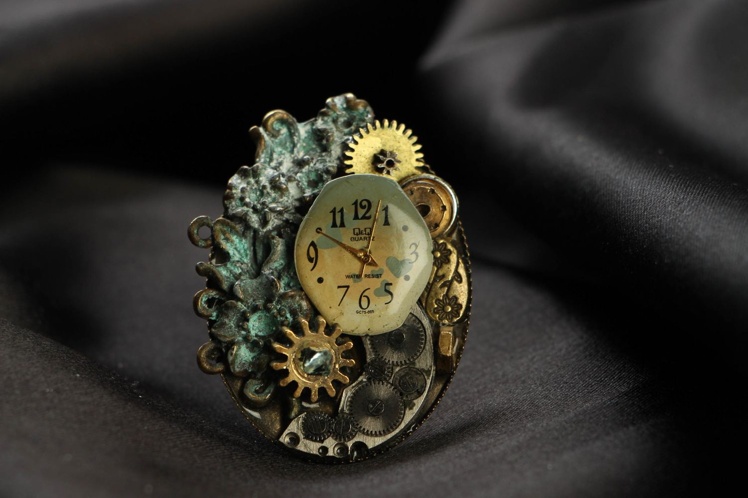 Large round metal ring in steampunk style photo 2