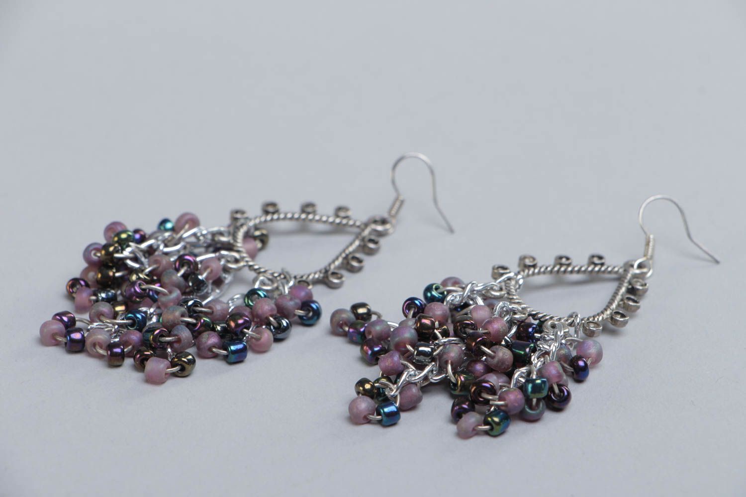 Long metal handmade earrings decorated with small beads photo 3