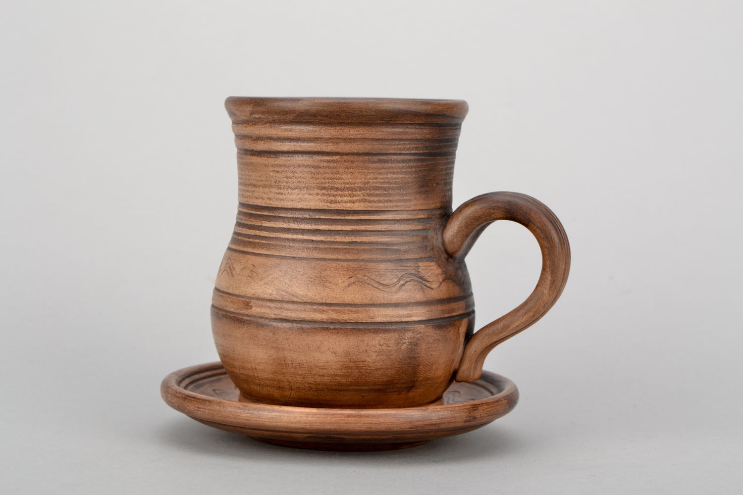 4 oz clay glazed drinking cup in pitcher shape with handle and rustic pattern photo 5