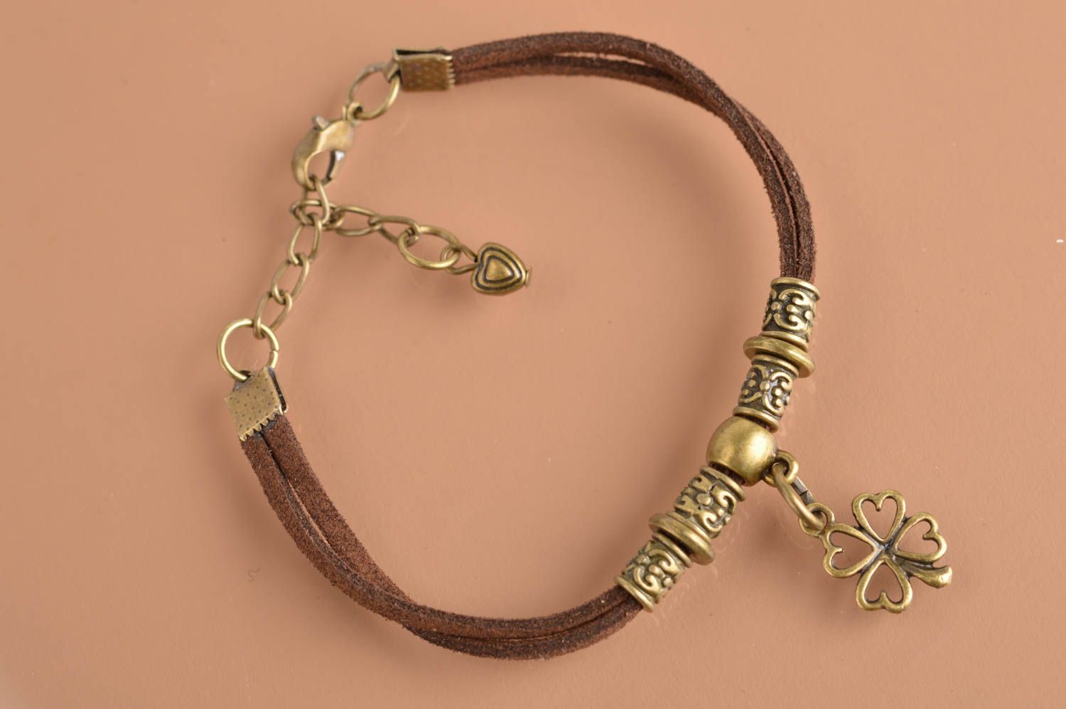 Beautiful handmade brown suede cord bracelet with metal charm photo 2
