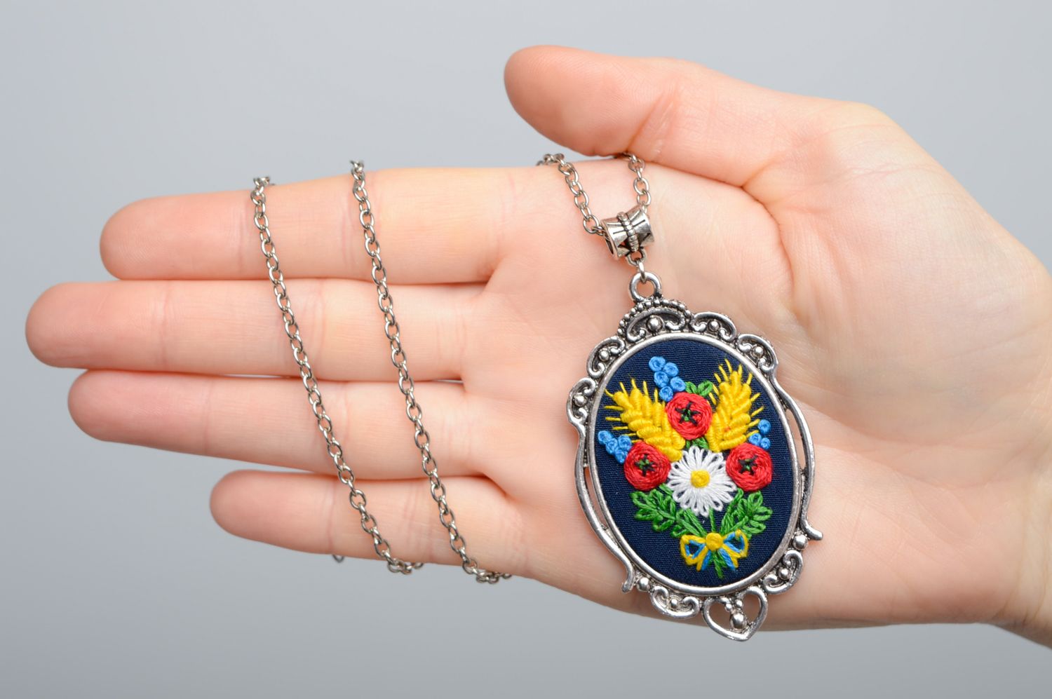 Pendant with French knot embroidery on long chain photo 3
