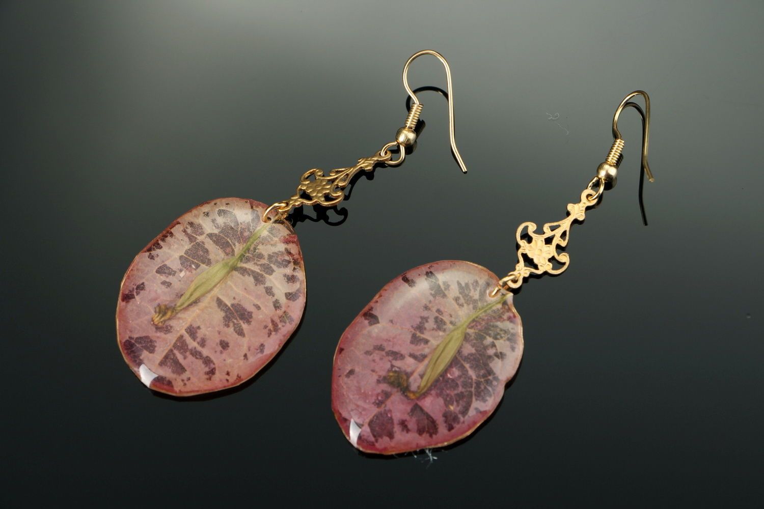 Beautiful earrings with the flowers of bougainvillea photo 3