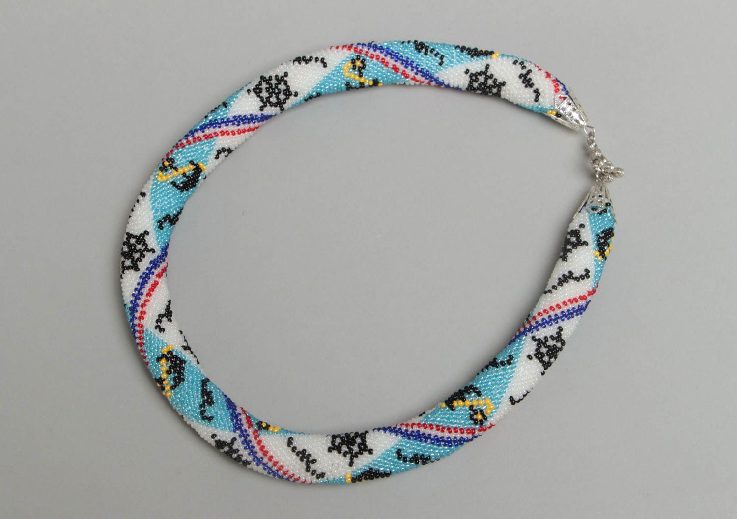Handmade designer women's beaded cord necklace with pattern in marine style photo 2