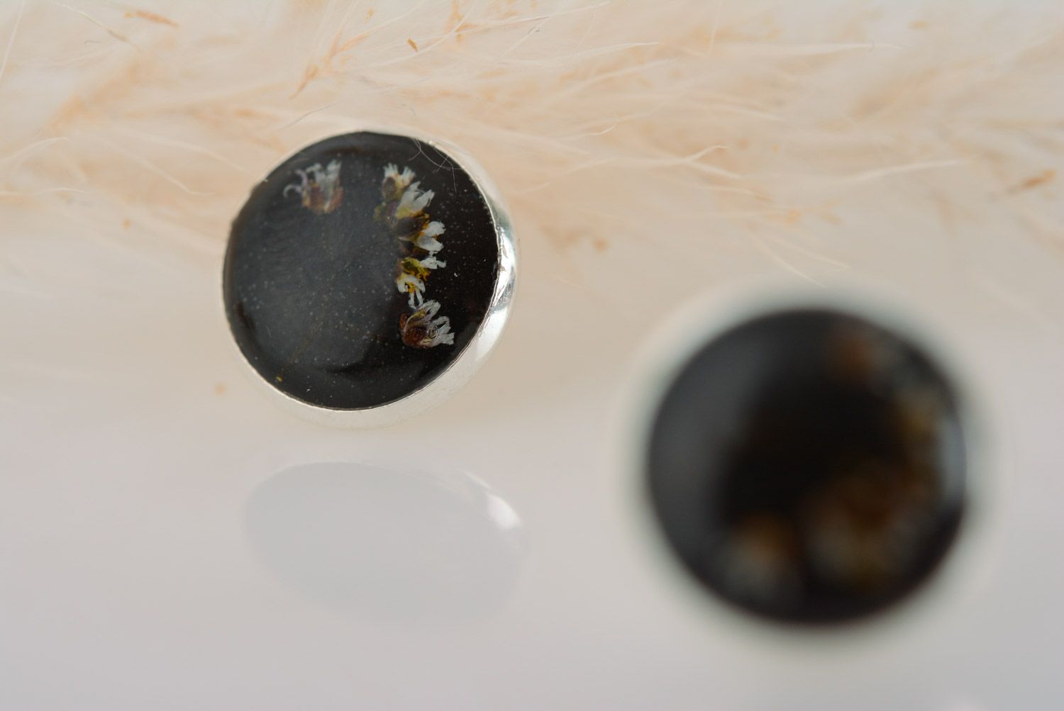 Homemade small black stud earrings with dried flower embedded in epoxy resin photo 4