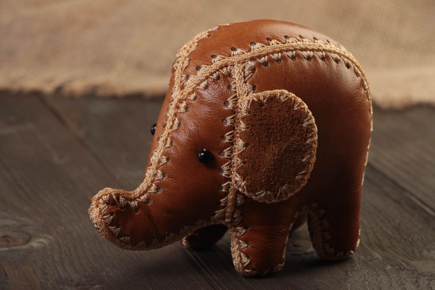 Handmade small designer soft toy cute elephant cub sewn of genuine brown leather photo 1