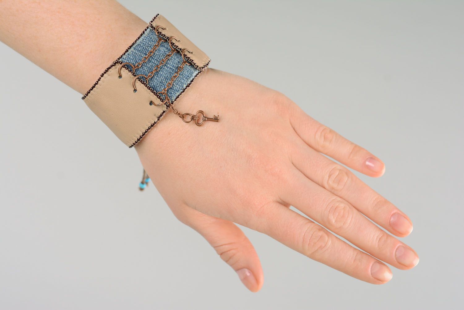 Leather bracelet with denim photo 2