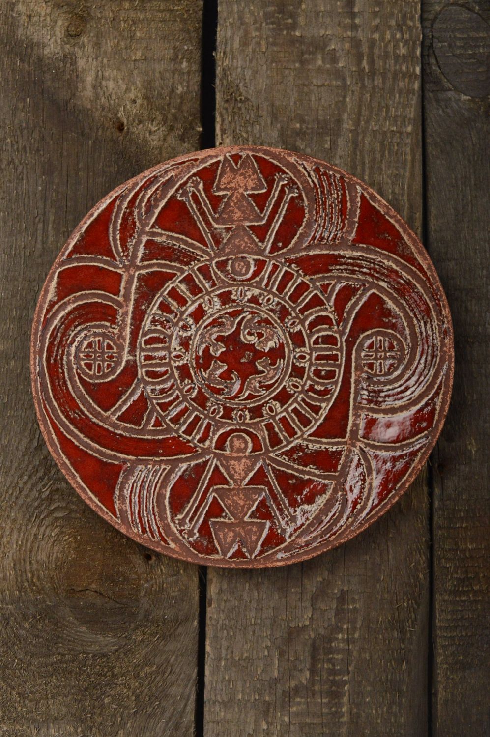 Assiette-amulette en céramique faite main Titan Pouroucha photo 1