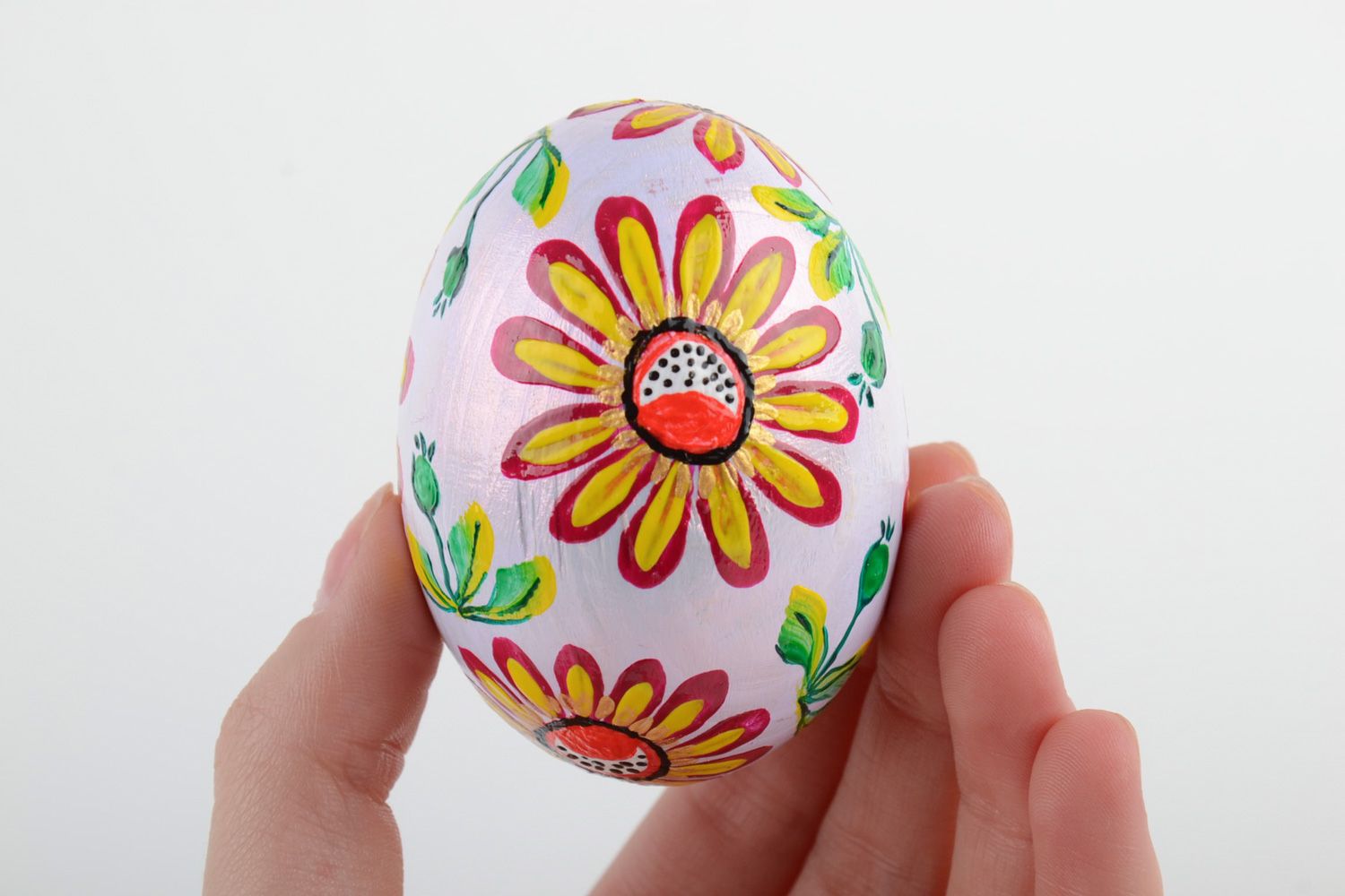 Handmade painted wooden Easter egg with bright flower son white background photo 5