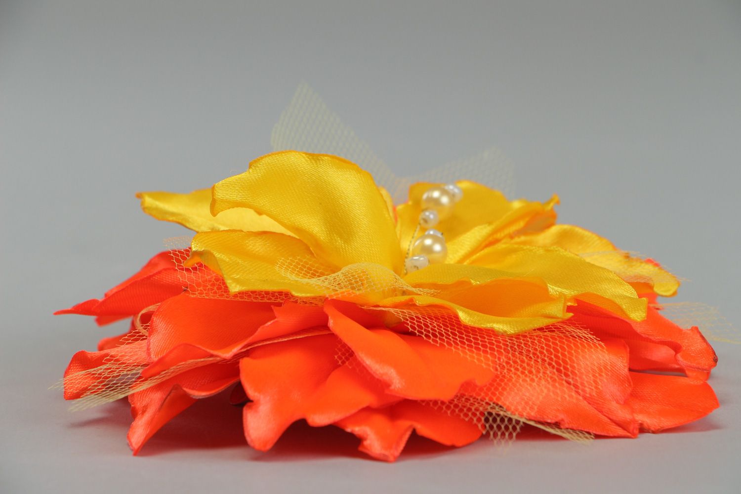 Handmade hair clip with volume yellow and orange lily flower made of satin fabric photo 2