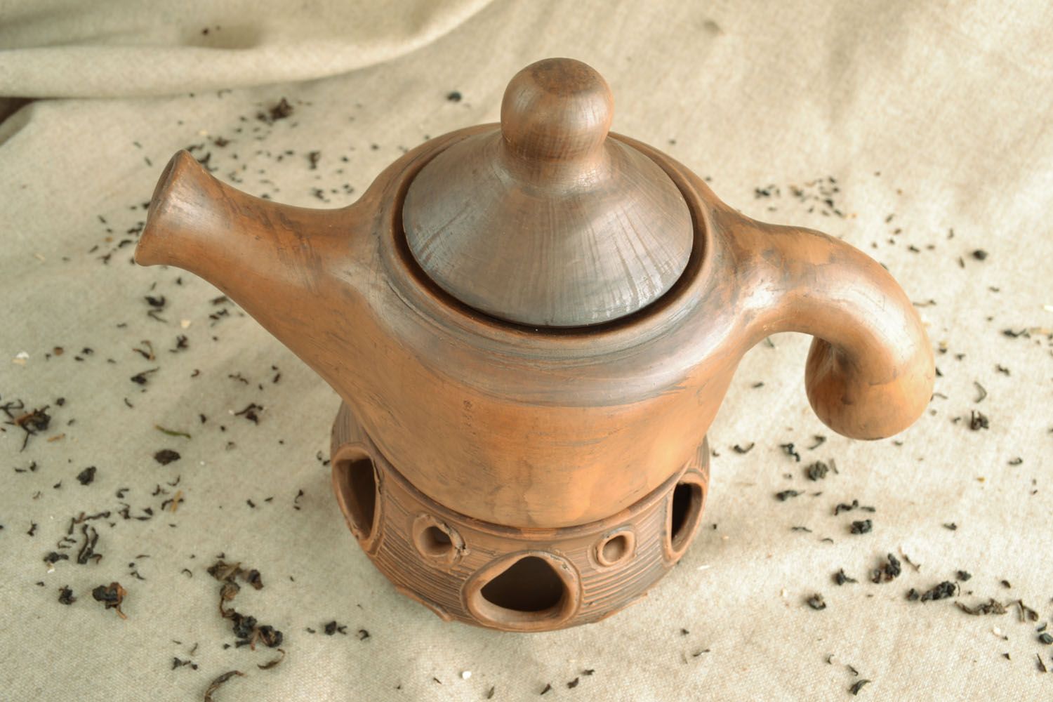 Ceramic teapot with holder photo 1