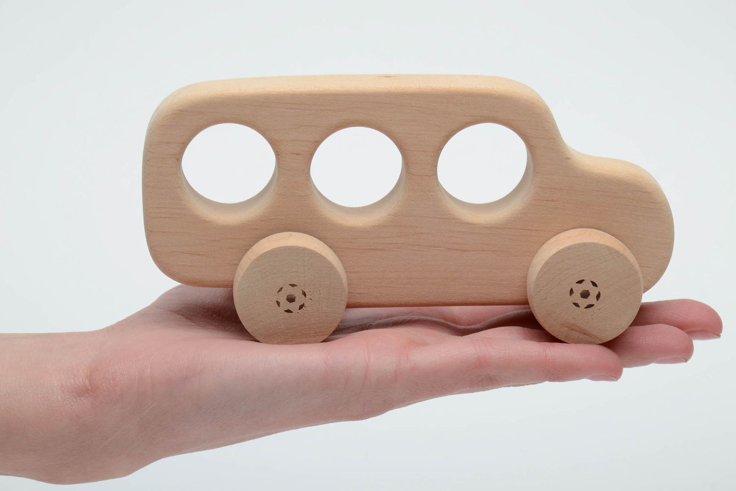 Wooden wheeled toy photo 5