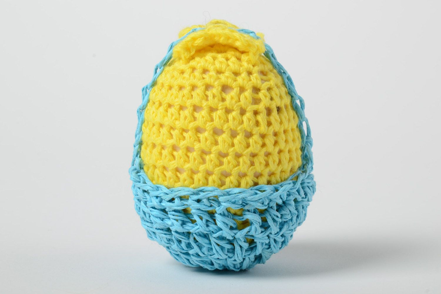 Handmade wooden egg crocheted over with yellow and blue threads Easter decoration photo 2