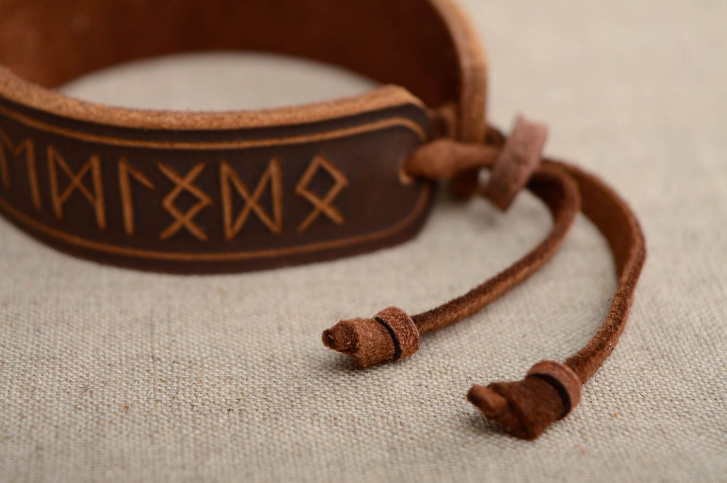 Leather bracelet with runes and ties photo 3