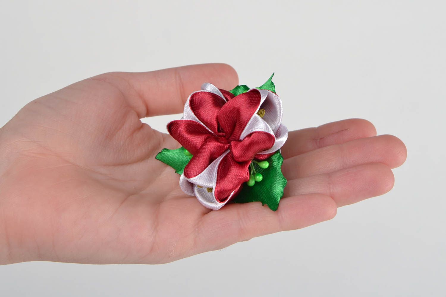 Children's handmade satin ribbon flower hair tie of red color photo 2