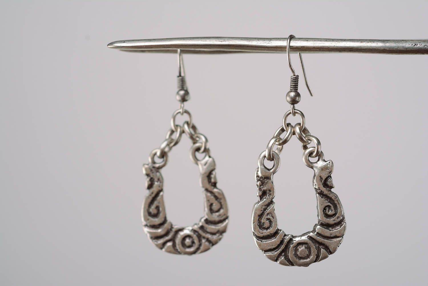 Metal ethnic earrings photo 3