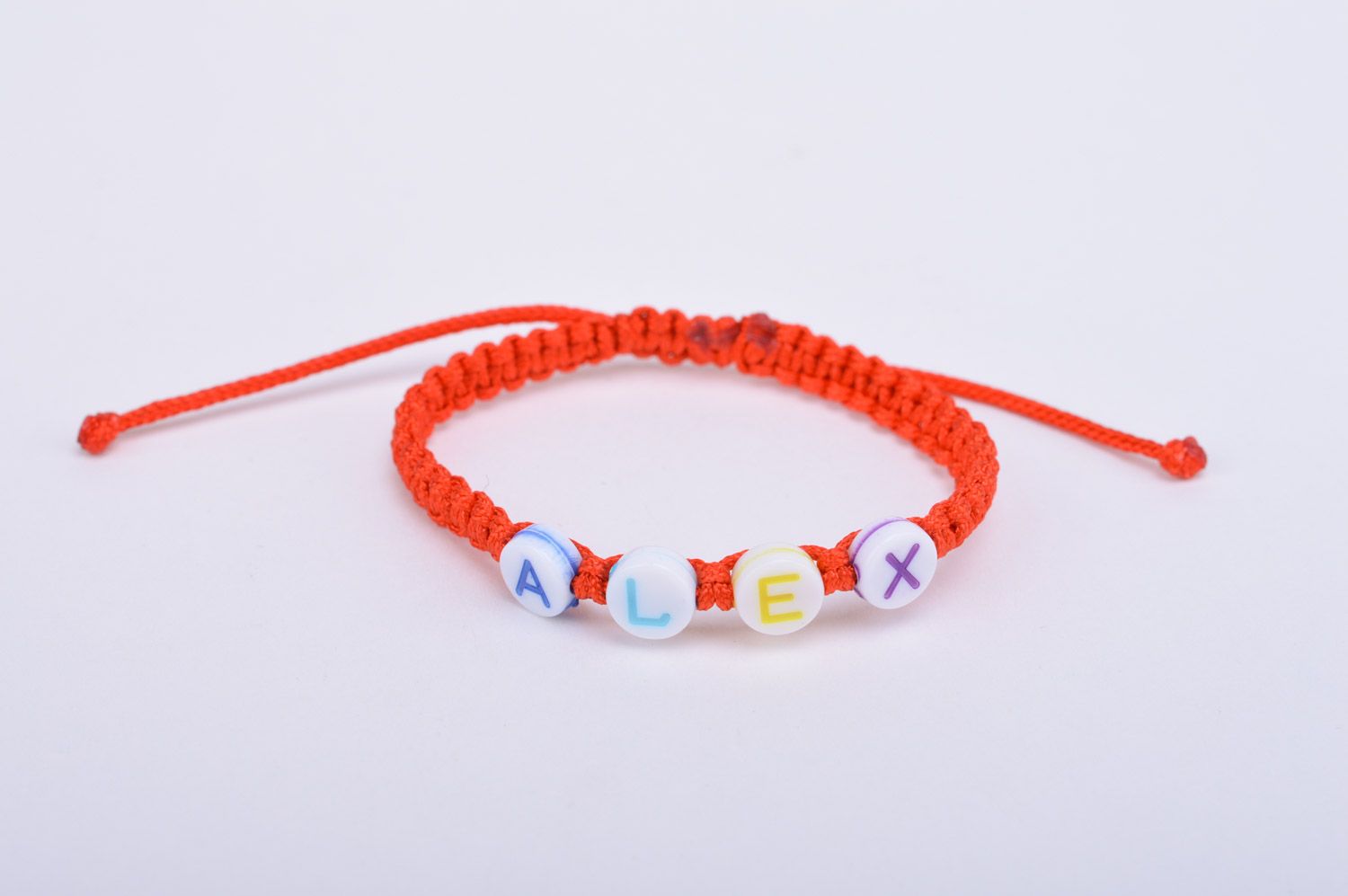 Handmade friendship name bracelet woven of red threads of adjustable size photo 2