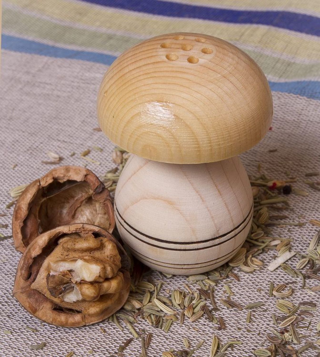 Wooden salt shaker in the shape of a mushroom photo 1