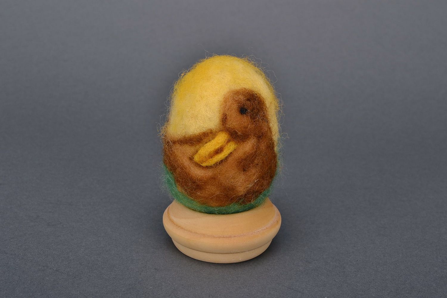 Egg on a wooden holder photo 4