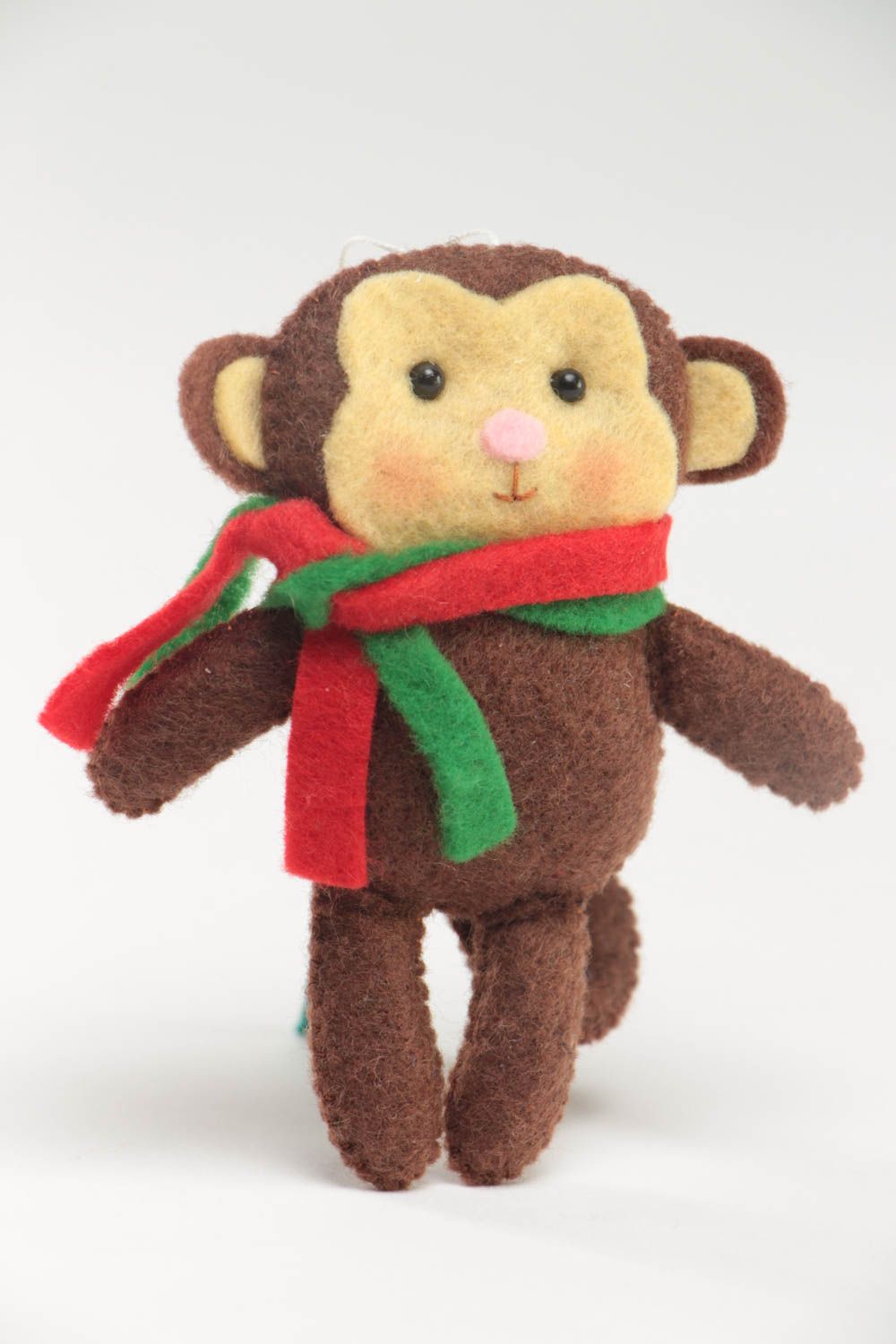 Petite décoration à suspendre en feutre brune en forme de singe faite main photo 2