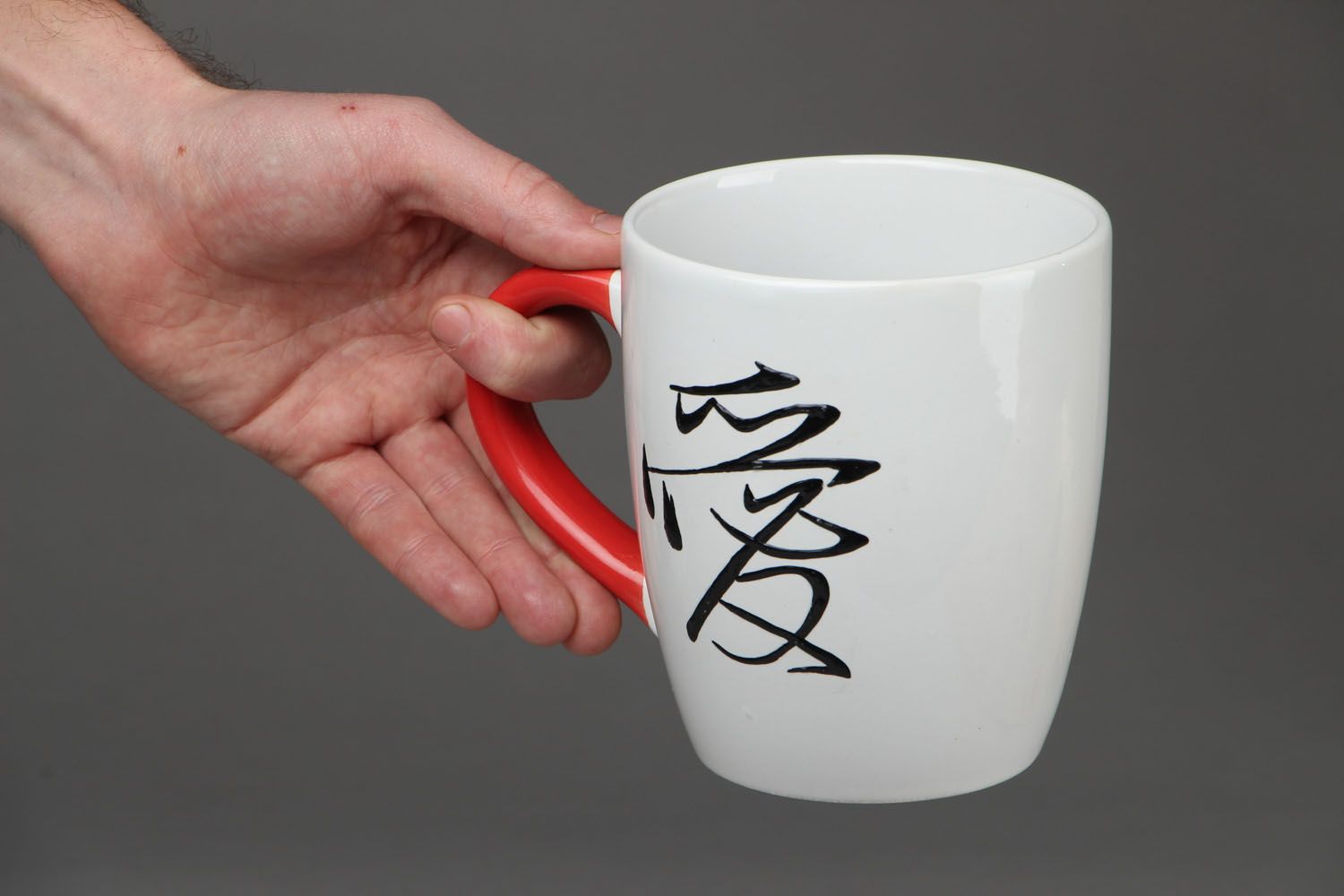 Japanese style white ceramic coffee or tea cup with red handle photo 4